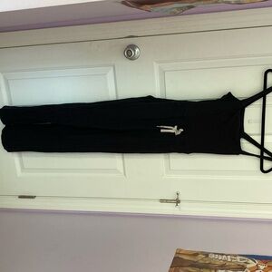 Black romper, wide legged, tie around waist